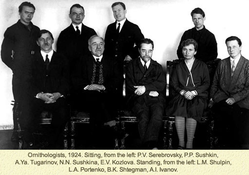 Ornithologists, 1924. Sitting, from the left:  P.V. Serebrovsky, P.P. Sushkin, A.Ya. Tugarinov, N.N. Sushkina, E.V. Kozlova. Standing, from the left: L.M. Shulpin, L.A. Portenko, B.K. Stegmann, A.I. Ivanov.